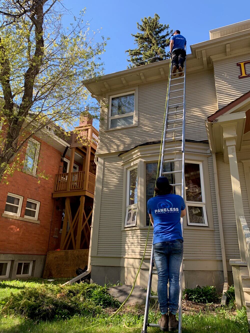 Eaves trough Cleaning Edmonton - gutters cleaned on building