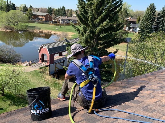 Edmonton gutter cleaning pro at work